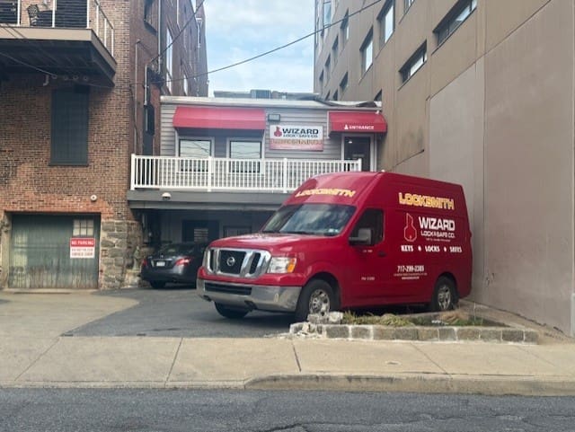 The Wizard Lock van parked in front of the store.